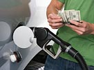Image: Buying gas (© moodboard/Corbis/Corbis)